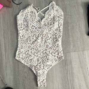 Lace cross back body suit